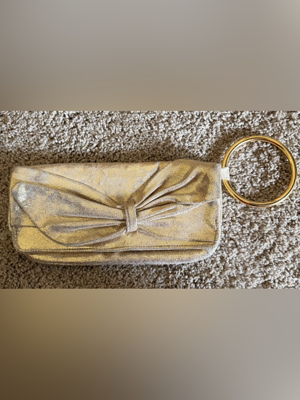 Sabina New York Gold leather clutch